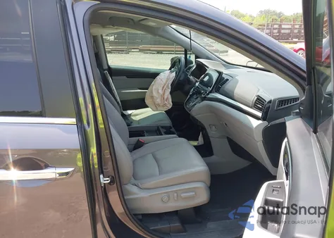 2022 Honda Odyssey Touring z USA, uszkodzony, nr VIN 5FNRL6H83NB023583